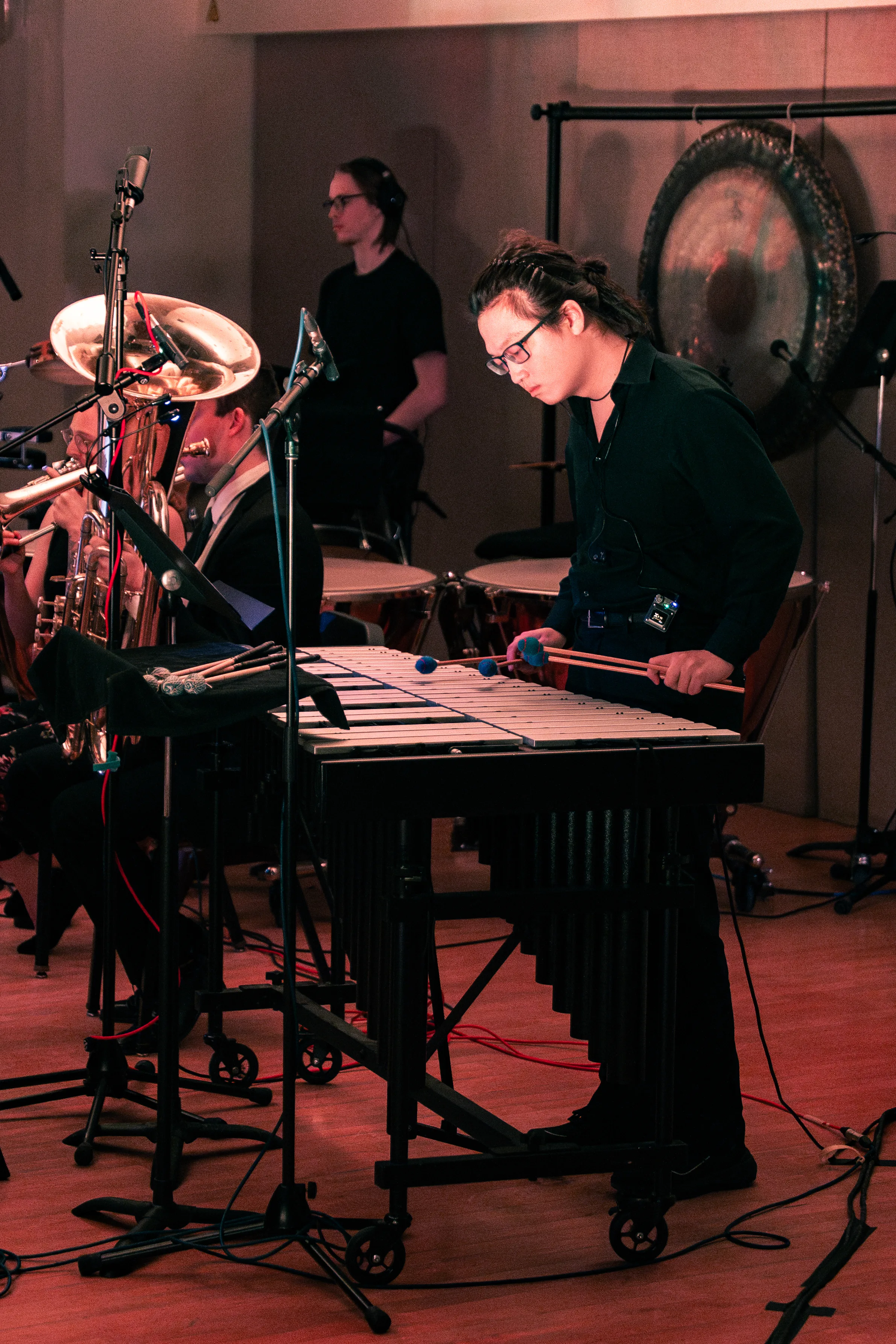 A minMAX percussionist performing Sister Boils Carrots Under a Leaking Roof